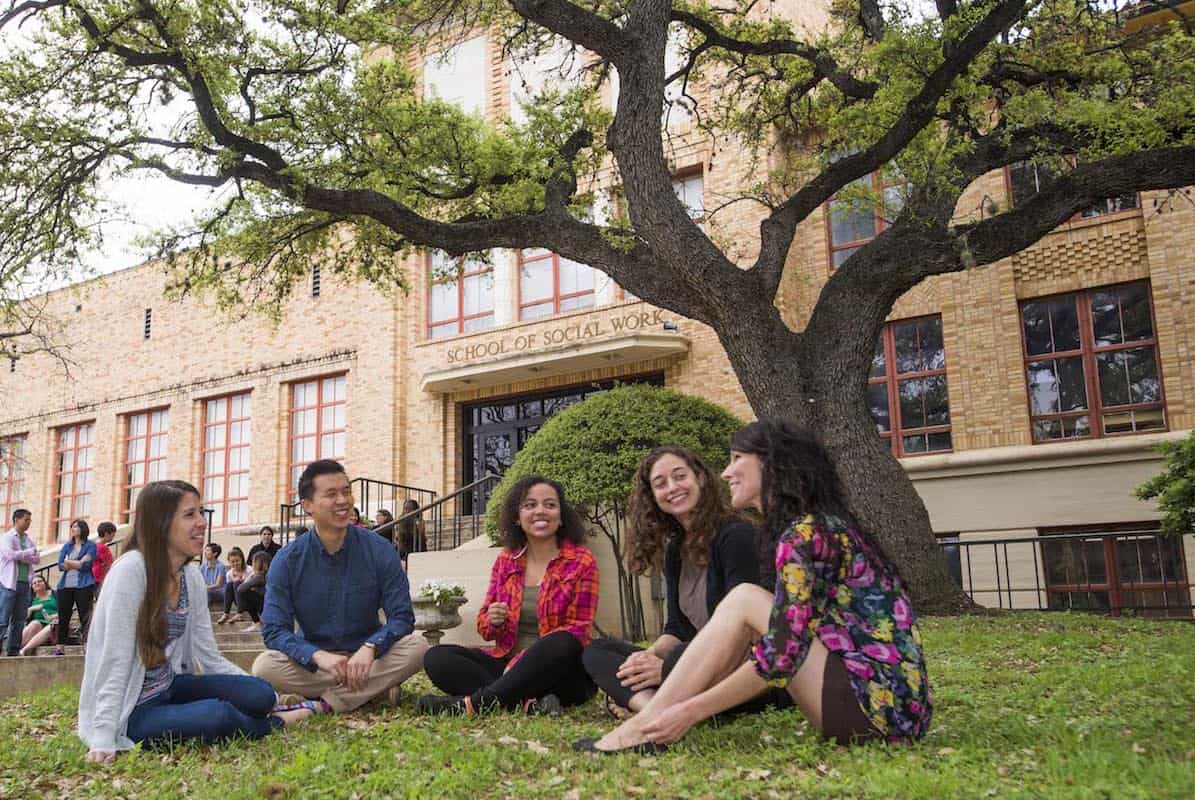 students in the front lawn of the social work building