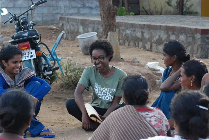 Junior Addis Gezahegn leads community activities while on the summer 2015 PUC trip to India