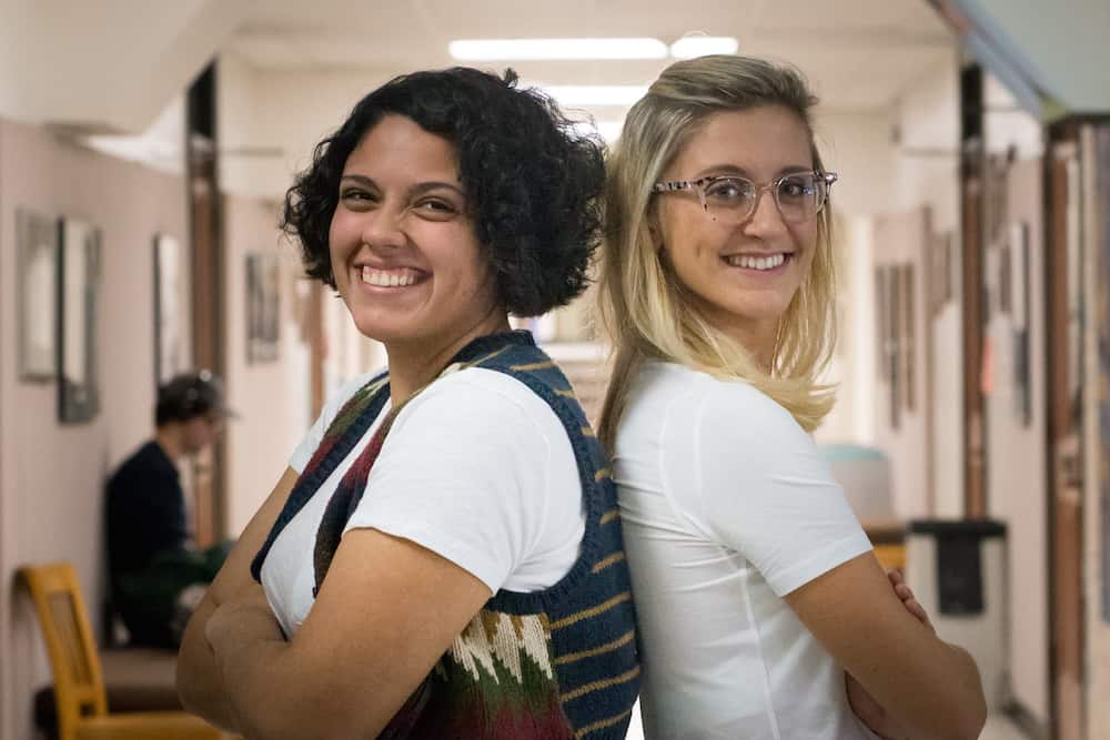 Two female students smiling
