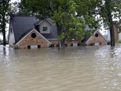 Home surrounded by floodwaters