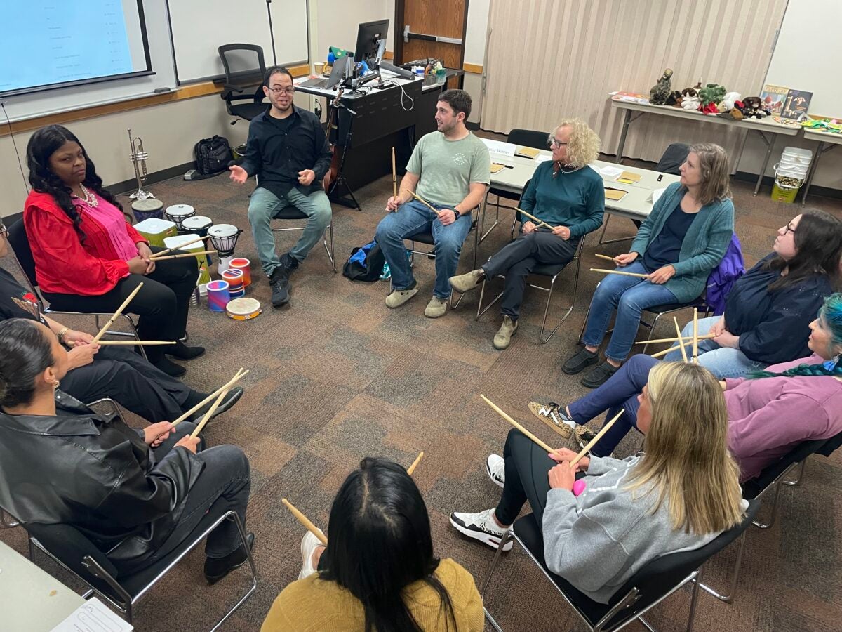 Image of participants in music and aging workshop led by Michael Romero, LCSW-S